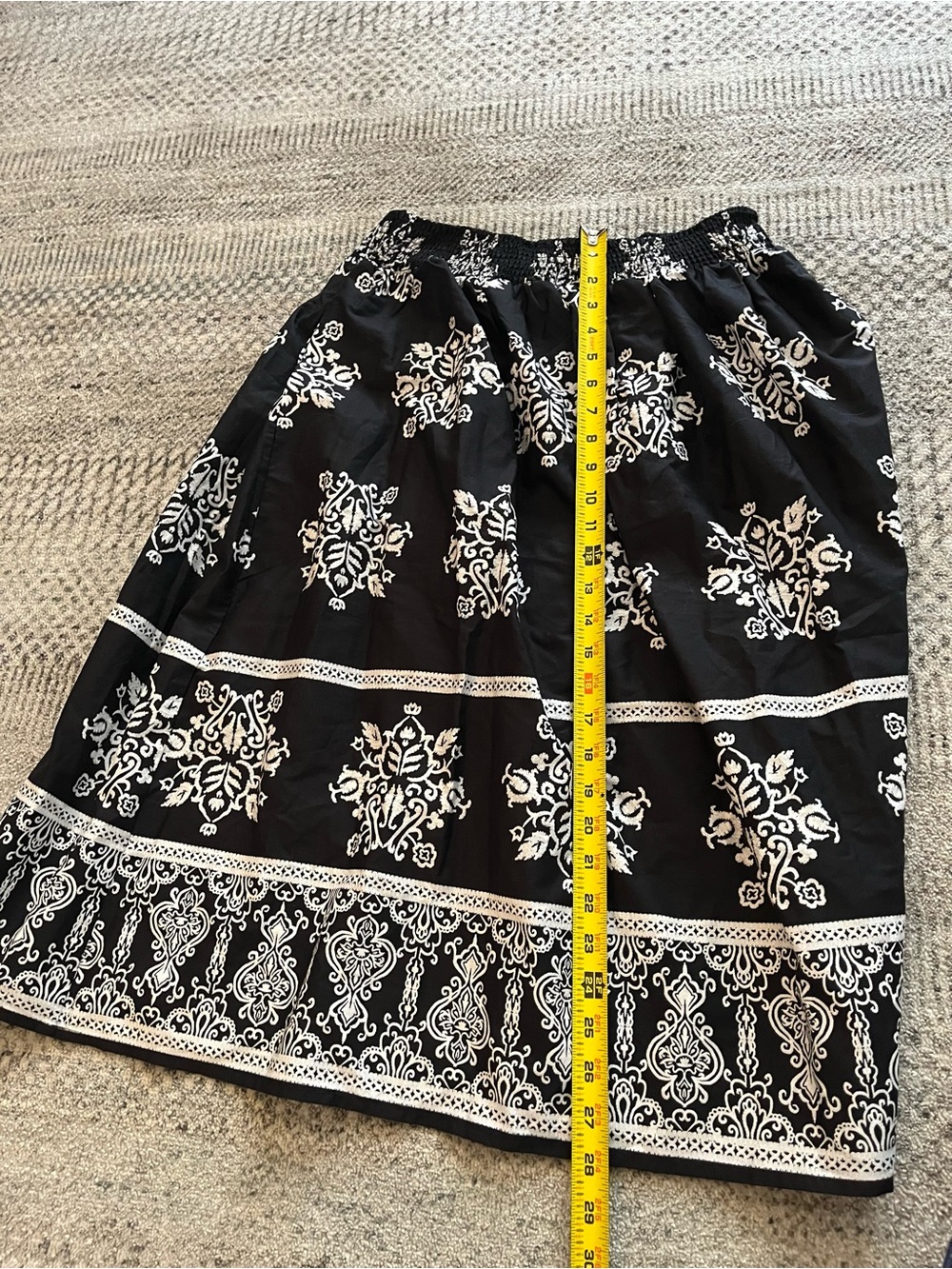 CeCe cotton poplin A-line midi skirt in black with a white botanical print. - Picture 5 of 7